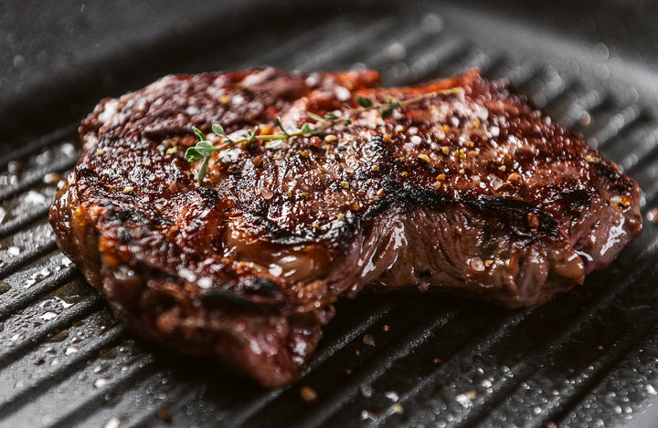 Blackwater bone-in sirloin steak on a slate board.